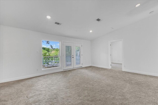 1125 Rodeo Center Blvd, Mesquite, TX 75149 - spare room featuring recessed lighting, carpet, french doors, and baseboards