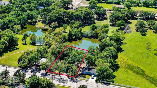 1125 Rodeo Center Blvd, Mesquite, TX 75149 - aerial overview of property's location featuring a large body of water and property parcel outlined