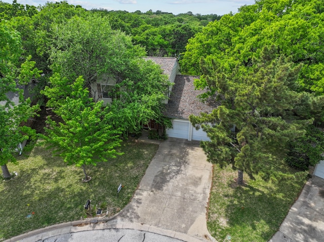 drone / aerial view with a forest view