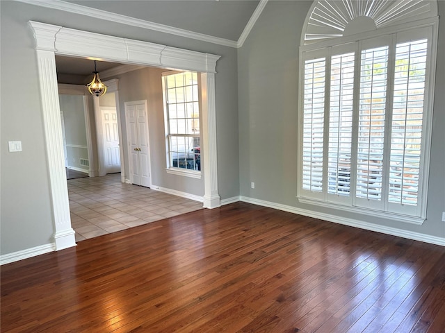 611 Twin Creek Dr, Allen, TX 75013 - unfurnished room featuring a chandelier, hardwood / wood-style flooring, baseboards, ornamental molding, and vaulted ceiling