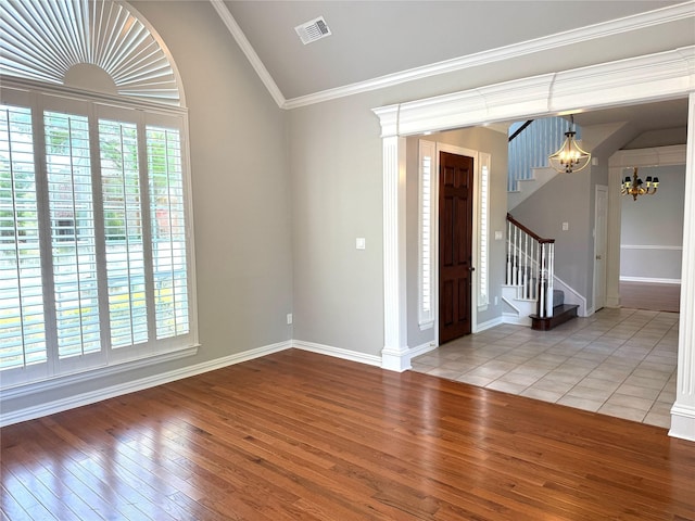 611 Twin Creek Dr, Allen, TX 75013 - empty room with hardwood / wood-style flooring, a chandelier, vaulted ceiling, stairs, and baseboards