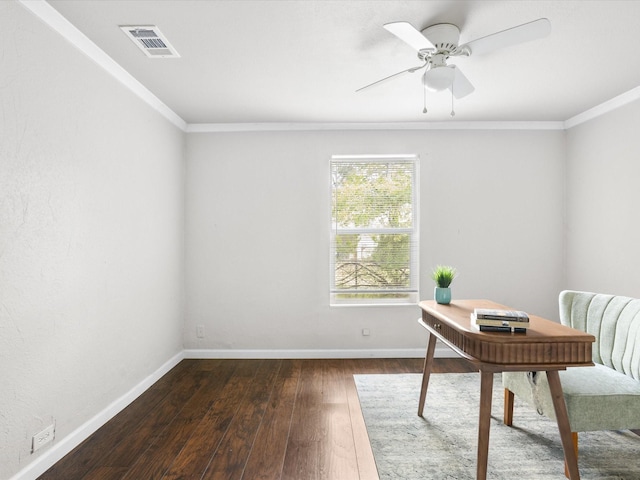 home office featuring dark wood finished floors, visible vents, baseboards, and ornamental molding