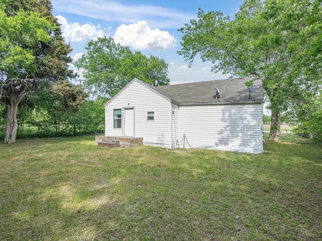 view of property exterior featuring a yard
