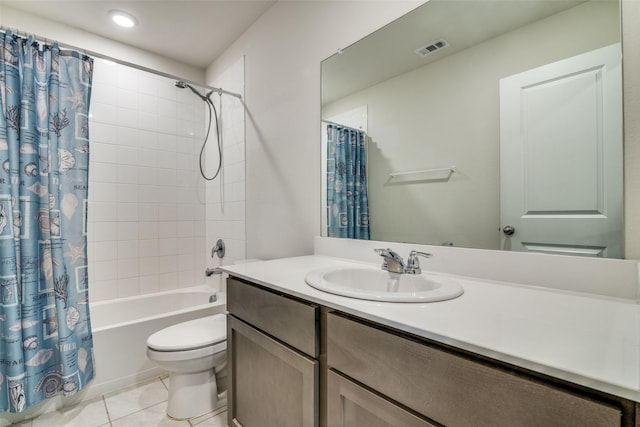 bathroom with tile patterned floors, shower / bath combo, toilet, visible vents, and vanity