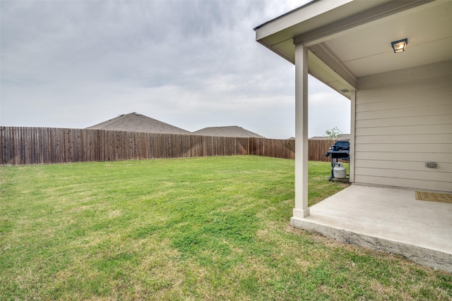 view of yard featuring a fenced backyard and a patio