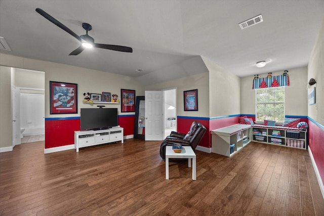 game room with baseboards, a ceiling fan, wood finished floors, and visible vents