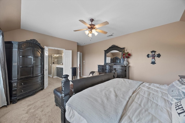 bedroom featuring lofted ceiling, visible vents, ceiling fan, and light carpet
