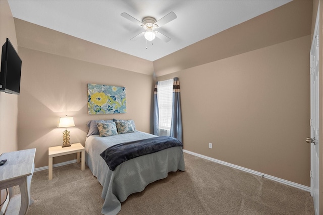 bedroom with carpet floors, a ceiling fan, and baseboards
