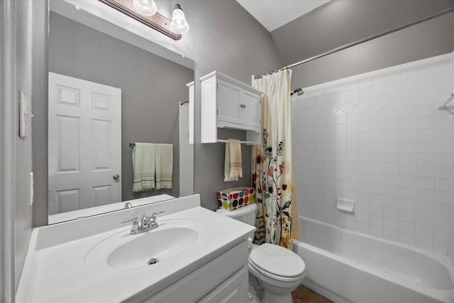 full bath featuring toilet, vanity, and shower / bath combo with shower curtain