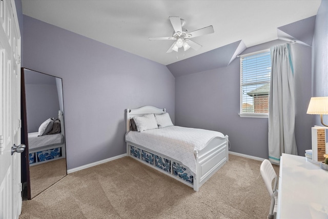 bedroom with lofted ceiling, baseboards, carpet, and ceiling fan