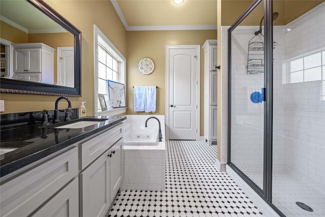 full bath featuring a shower stall, tile patterned flooring, a whirlpool tub, vanity, and crown molding