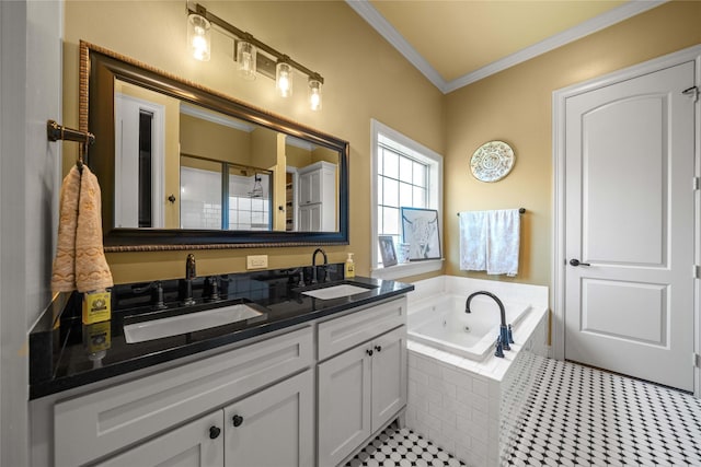 bathroom featuring double vanity, a jetted tub, a sink, and ornamental molding