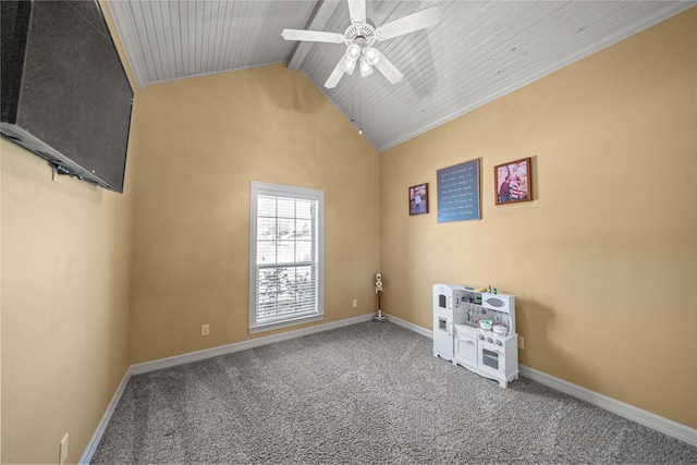 empty room featuring vaulted ceiling, carpet floors, baseboards, wood ceiling, and ceiling fan