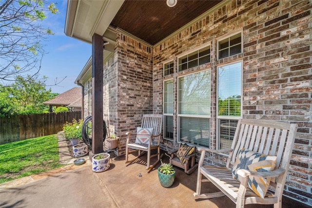 view of patio with fence