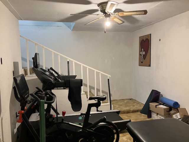 workout area with a ceiling fan