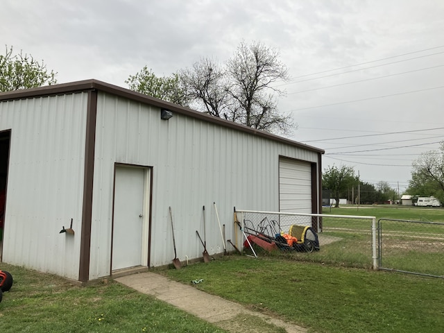 view of outdoor structure with an outdoor structure and fence
