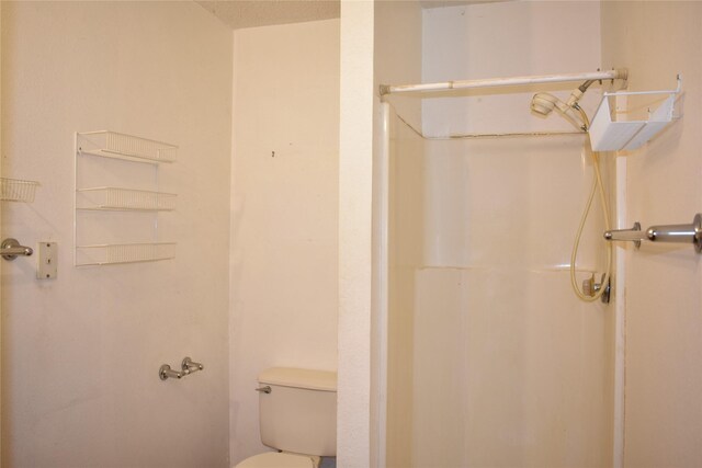 4912 Williford Rd, Sachse, TX 75048 - bathroom with toilet and a shower