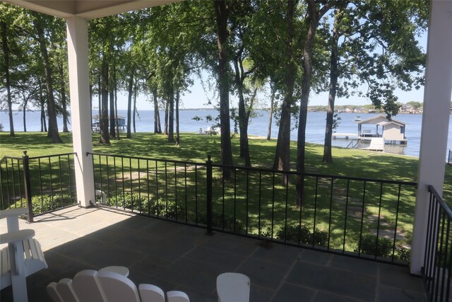 exterior space with a water view