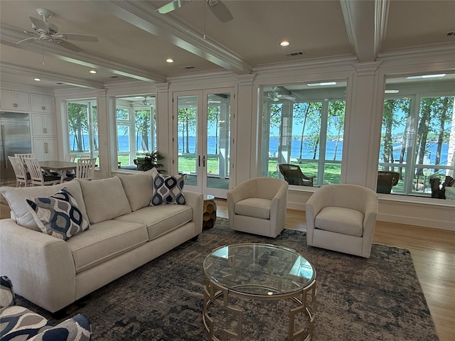 sunroom / solarium with french doors, visible vents, and beam ceiling