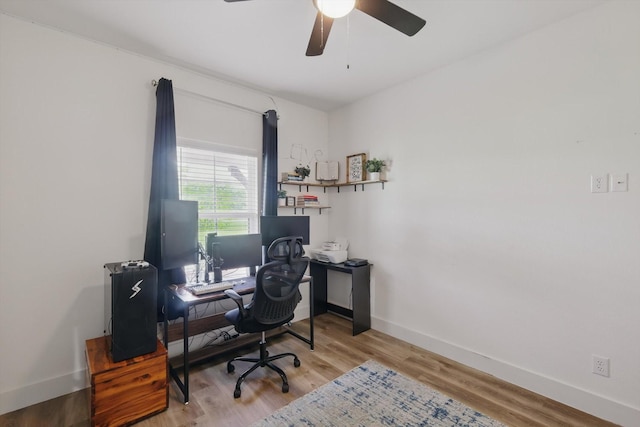 3728 George Owens Rd, Ponder, TX 76259 - home office featuring a ceiling fan, baseboards, and wood finished floors