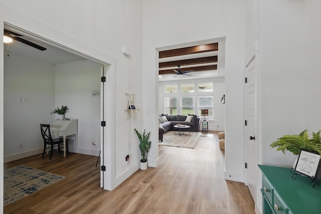 3728 George Owens Rd, Ponder, TX 76259 - hall with light wood-style flooring, beam ceiling, and baseboards