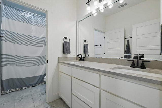 3728 George Owens Rd, Ponder, TX 76259 - full bath with double vanity, toilet, and curtained shower