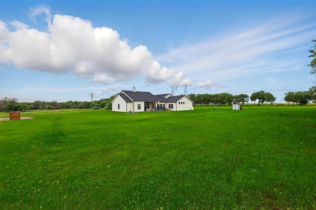 3728 George Owens Rd, Ponder, TX 76259 - view of grassy yard featuring an outdoor structure and a storage unit