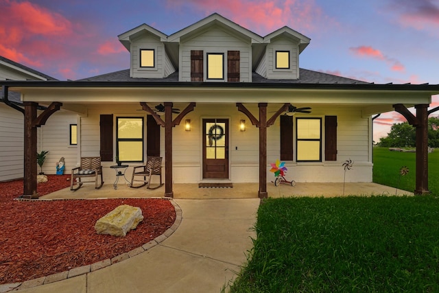 3728 George Owens Rd, Ponder, TX 76259 - view of front facade featuring a ceiling fan, covered porch, a front lawn, and a shingled roof