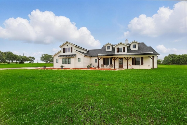 3728 George Owens Rd, Ponder, TX 76259 - view of front facade featuring a porch, a front lawn, a chimney, and a shingled roof