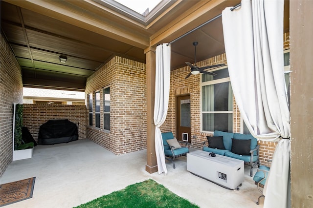view of patio with an outdoor hangout area and a ceiling fan