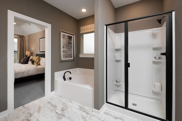ensuite bathroom with a bath, marble finish floor, a shower stall, and baseboards