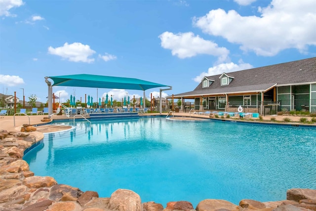 community pool featuring a patio