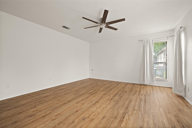 6245 Century Dr, Kennedale, TX 76060 - empty room with light wood-style flooring, visible vents, a ceiling fan, and baseboards