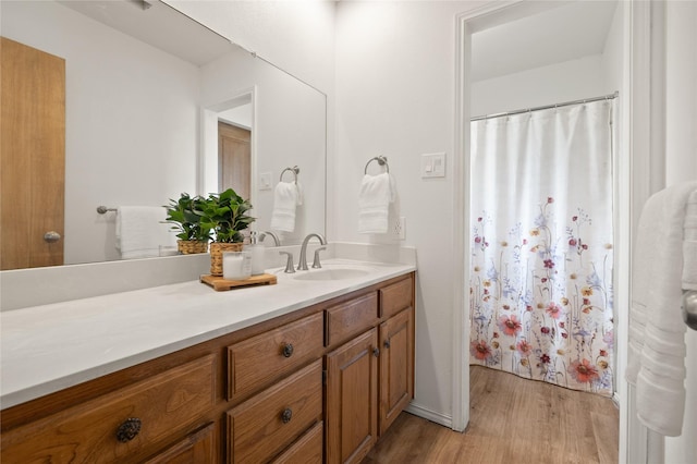 6245 Century Dr, Kennedale, TX 76060 - full bath featuring baseboards, wood finished floors, and vanity