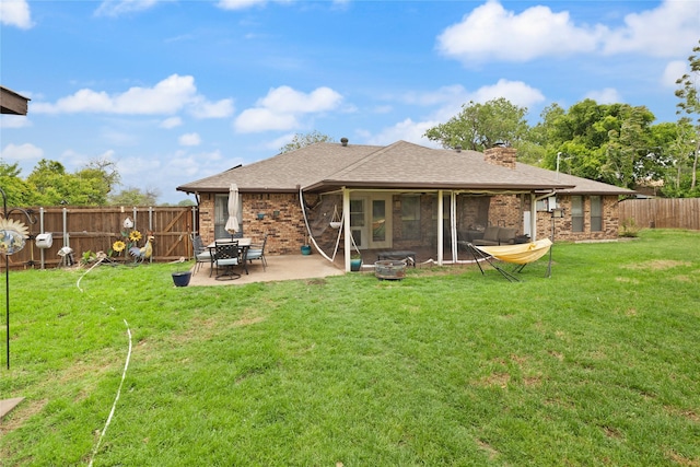 6245 Century Dr, Kennedale, TX 76060 - rear view of house featuring a fenced backyard, a chimney, brick siding, and a patio