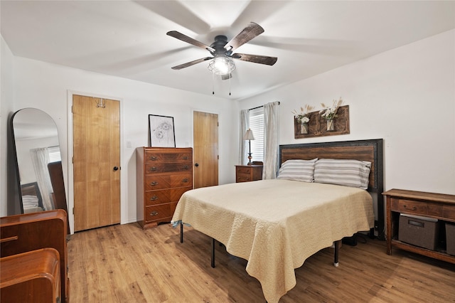 6245 Century Dr, Kennedale, TX 76060 - bedroom featuring light wood-type flooring and a ceiling fan