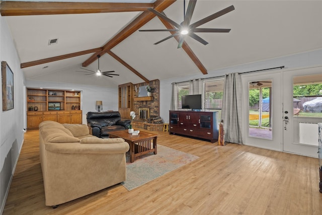 6245 Century Dr, Kennedale, TX 76060 - living room with a ceiling fan, beamed ceiling, wood finished floors, and visible vents