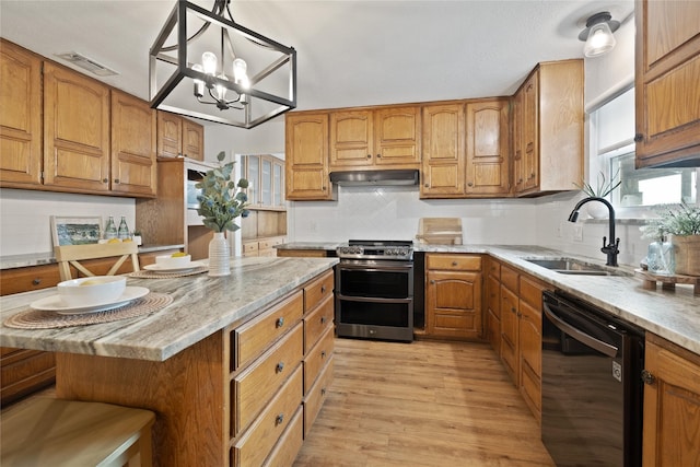 6245 Century Dr, Kennedale, TX 76060 - kitchen featuring a sink, dishwasher, range with two ovens, under cabinet range hood, and visible vents