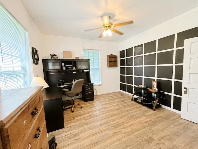 107 N Main St, Crandall, TX 75114 - office area featuring light wood-type flooring, a ceiling fan, and baseboards