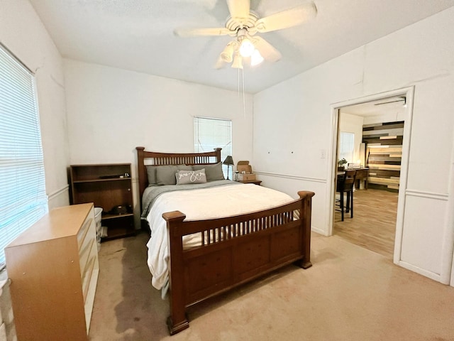 107 N Main St, Crandall, TX 75114 - bedroom with light carpet and a ceiling fan