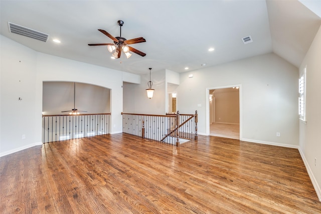 unfurnished room with a ceiling fan, wood finished floors, visible vents, and recessed lighting