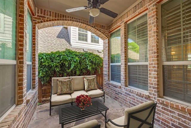 view of patio featuring an outdoor hangout area and a ceiling fan