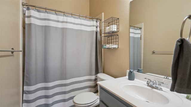202 Beacon Hill Ln, Forney, TX 75126 - bathroom with vanity, a textured wall, and a shower with curtain