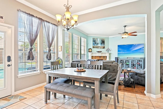 202 Beacon Hill Ln, Forney, TX 75126 - dining room with crown molding, light tile patterned floors, plenty of natural light, and ceiling fan