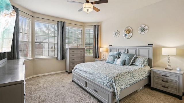 202 Beacon Hill Ln, Forney, TX 75126 - bedroom featuring multiple windows, light carpet, and ceiling fan