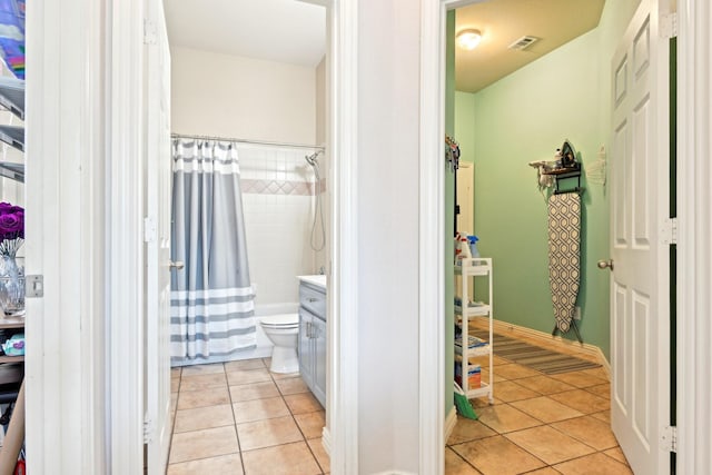 202 Beacon Hill Ln, Forney, TX 75126 - full bathroom with tile patterned floors, a shower with shower curtain, toilet, and vanity