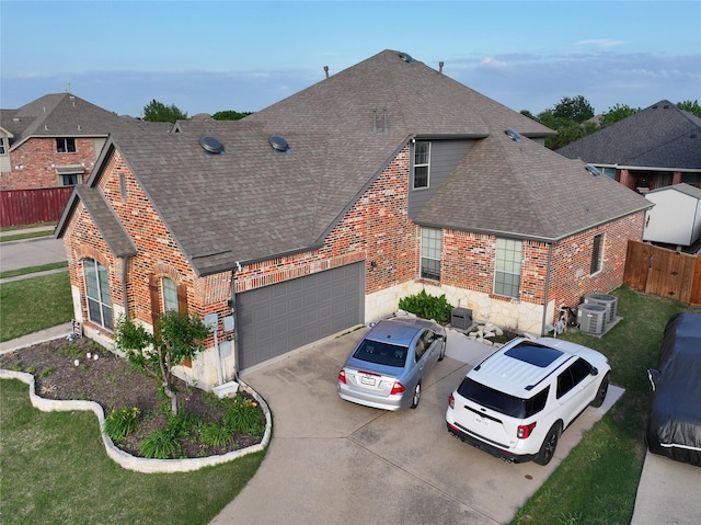 202 Beacon Hill Ln, Forney, TX 75126 - view of front facade with roof with shingles, brick siding, stone siding, and concrete driveway