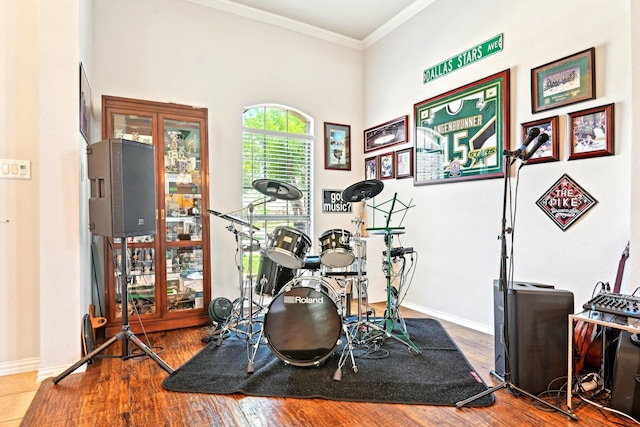 202 Beacon Hill Ln, Forney, TX 75126 - recreation room featuring ornamental molding, baseboards, and wood finished floors