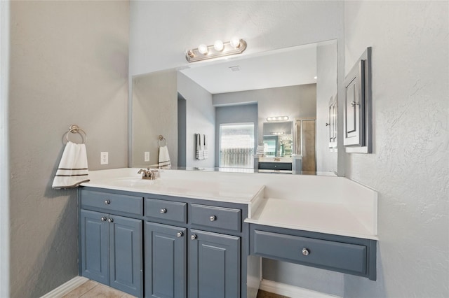 5808 Arabian Dr, Grand Prairie, TX 75052 - bathroom featuring a textured wall and vanity