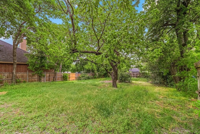 view of yard with fence